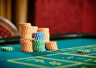 Live dealer table studio with cards and screen